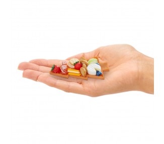 Capsula sorpresa Miniverse Make It Mini Holiday WB Licensed Movie surtido